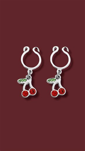 3.2K reactions · 123 shares |  Fun & Flirty! Our Dangle Cherry CZ Clip-On Nipple Rings are perfect for trying the look without the commitment—or pulling off a one-time surprise.  No piercing needed, super easy to wear, and seriously cute. ✨ #CherryVibes #ClipOnJewelry #NoPiercingNoProblem #SweetAndSpicy #BodyJewelryFun #FlirtyLooks | BodyJewelry.com | Facebook