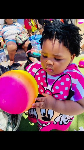Beach Vacation Fun with Cute Child and Beach Ball