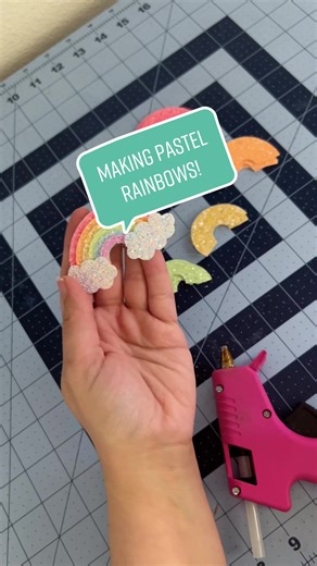 Making pastel glitter rainbows! #rainbow #spring #lookingsweetinbp #easter #glitter #pastels #clips #headbands #diy