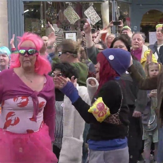 'Save our Swim' - flash mob descends on Stroud town centre to protest about outdoor pool closure