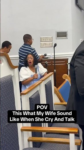 Hooked by a moment: my wife giving a powerful testimony at church.