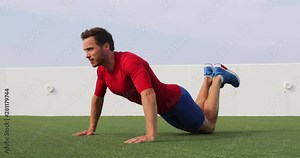 Fitness man doing knee push ups exercise at outdoor gym. Easy beginner workout by athlete doing pushup on grass working out exercising core and arms. Real time 29.97 FPS. See other exercises.