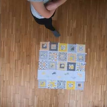 Quilt Making: Laying out a baby quilt top "Small Steps"