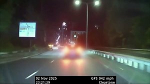 Moment driver launches fireworks from car window during police chase
