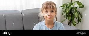 Adorable cute little vlogger looking at webcam, smiling child girl talking to camera making video call vlog communicating online sitting on couch at Stock Photo - Alamy