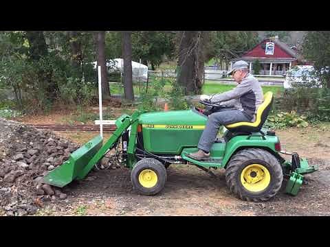 John Deere 445 Moving Rocks and Rubble with Little Buck Loader - 425, 455