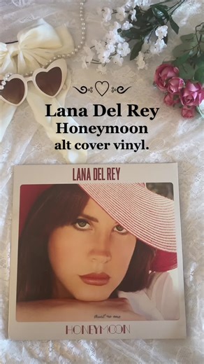 I think this is my favorite vinyl of all time. Urban Outfitters red alternate cover Honeymoon ♥️♥️ #fyp #lanadelrey #vinyl #lanadelreyvinyl #lanadelreyedit #lanadelreyaesthetic #lanadelreystans #lanastan #lanacult #lanadelreyfan #lanatok #lanatiktok #coquette #dollette #girlblogger #honeymoon #vinylrecords #vinyltok