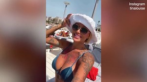 Tina Louise flaunts her ample assets during vacation
