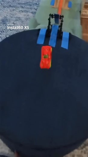 Diecast Stunt Dad on Instagram: "The quadruple front flip goes hard. I frequently get asked 2 things: 1) how do I get these shots? I am using an @insta360 X5 on a selfie stick and running next to the track with the camera hovering over. 2) how many attempts? I never count the number of attempts but between setup, takedown and filming it took 1.5 hours and I landed it four times. This is one of the 4. #insta360x5 #hotwheels #stuntdad #toys #diecast @hotwheelsofficial @nuggetcomfort @trackjack.kle