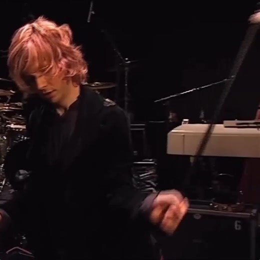 Beck performing “Devil’s Haircut” Live on the 19th of November, 1999 on Dutch Music TV Show “2 Meter Sessions” When Beck dropped Devil’s Haircut, people heard irony, collage, Gen-X shrug. That reading lets you laugh and move on. It misses the point. This track isn’t random, it’s precision disguised as disorder, a lesson in how to make stupidity work harder than sincerity ever could. Nothing here resolves because it’s not trying to. The beat lurches like it’s about to fall apart, then snaps back