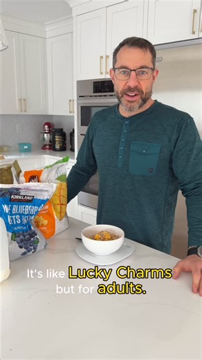 Aaran Ferguson | Busy Parent Fitness Coach on Instagram: "You don’t have to grow up THAT hard. This is Lucky Charms… for people with a mortgage and lower back tightness. Same colorful, crunchy, nostalgic vibe. Just upgraded so it doesn’t ruin your morning. Real fruit instead of neon marshmallows Milk that actually does something for your body Optional protein powder so it counts as a meal Granola for crunch, carbs, and staying power It tastes like Saturday morning cartoons. It fuels like an adul