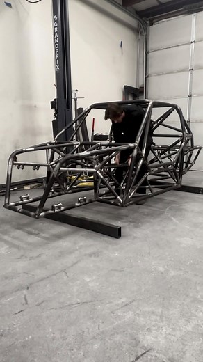 Cameron Cocalis on Instagram: "How much do you think the E30 weighs? The E30 chassis is off the chassis table and ready to get welded up. Figured out I could lift it by myself, so it can’t be that heavy. Also a good reference for how small this car is, and how tall I am 😂 • • #e30 #welding #cars #fabrication"