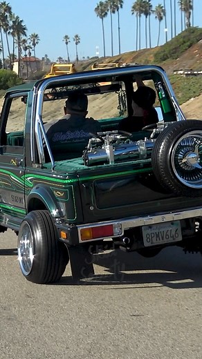 Suzuki Samurai LOWRIDER hitting switches in side to side motion, even bouncing the rear end off the ground! 🏖️ | Skid Society