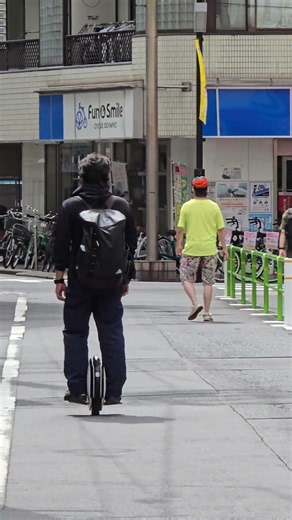 found a cool motor unicycle rider in Tokyo streets! #tokyo #japan #unicycle #street #cool #city #東京