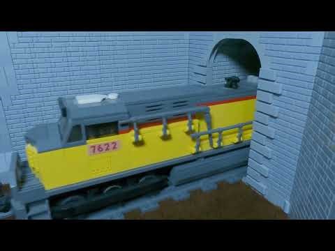 LEGO / BuWizz - A long and heavy manifest freight train exiting a tunnel moved by 5 UP locomotives