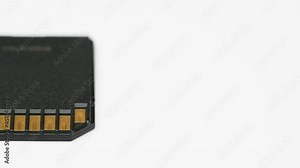 clips video 4k and full HD of memory SD card isolated on clean background this sd card for various computer, digital camera and smart mobile phone devices.