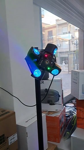 Cabeza Móvil DJ Beam 3 en 1: luces RGBW y sonido profesional