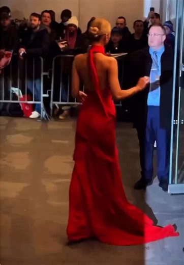 Bella Hadid arriving at the premiere of The Beauty in New York City wearing a red Schiaparelli dress #bellahadid #streetstyle #fashion #style #model
