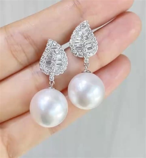 Nacre Mutiara Indonesia on Instagram: "High quality pearl with PSL Certificate, white gold setting, accented with 2.63 ct diamonds. Subtle luxury, timeless elegance🤍 14.2 mm aurora venus pearl Join us for first access to rare collections & special offers. 💎✨ 📸 Instagram | 📢 Telegram | 💬 WhatsApp 🔗 Join now through the link in bio! #earring #earrings #diamondearring #jewelry"