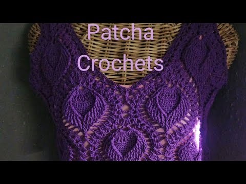 Clip 3: Sleeveless knitted top with heart pattern, purple color.