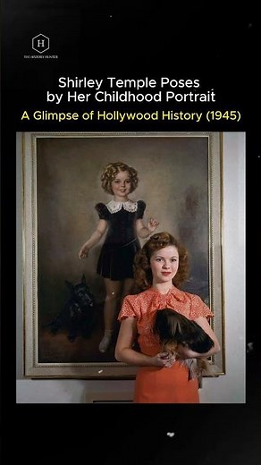"Shirley Temple Poses by Her Childhood Portrait – A Glimpse of Hollywood History (1945)"