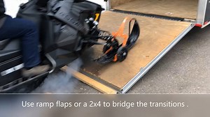 When you don't have snow at home, use Skisaver Flex snowmobile ski wheels to load sleds on your bare driveway, and go find the snow! | Skisaver Flex Snowmobile Ski Wheels