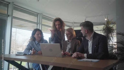 Angry female executive scolding team for mistakes and poor work quality in a modern office, highlighting negative business outcomes and professional tension.