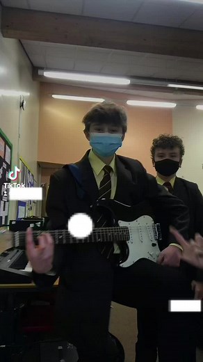 School Band Practice: Guitar Performance in 2022