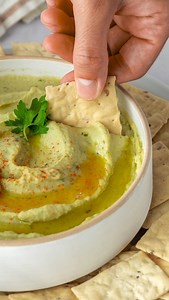 This easy White Bean Dip comes together in a matter of minutes, is LOADED with flavor, and is packed with protein and fiber! With layers of zippy flavor from fresh garlic, champagne vinegar, lemon juice, parsley, and rosemary, this healthy dip is scrumptious with raw veggies, pita, or crackers...and it's also tasty stuffed into a wrap, spread on a sandwich or burger, and dolloped over a grain or protein bowl. Can you say delicious *and* versatile?!😉 https://www.fivehearthome.com/white-bean-dip/