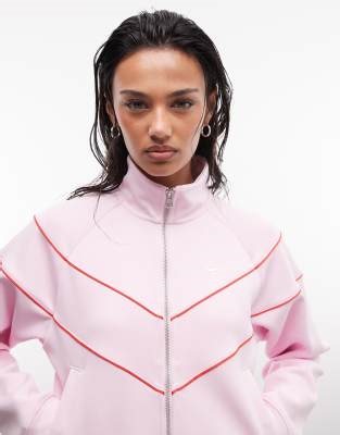 Nike woven windrunner track jacket in light pink | ASOS
