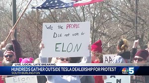 Vermonters protests at South Burlington Tesla dealership