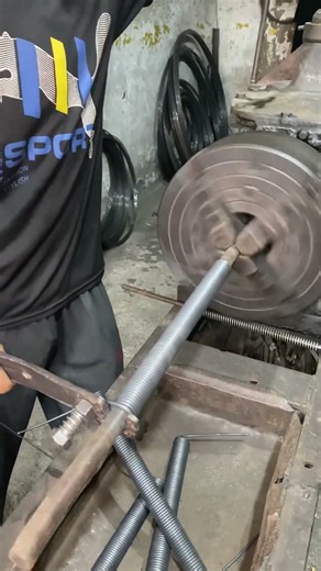 Beyond automation: Making a long tension spring on lathe by hand #diy #shortvideo #shorts