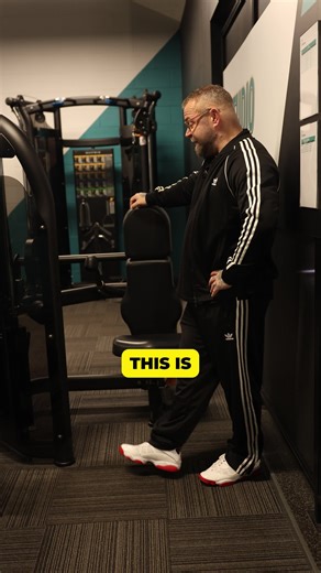 This is the tricep dip machine. Being able to push yourself up matters for real life—build strength here and work your way toward dipping your own bodyweight