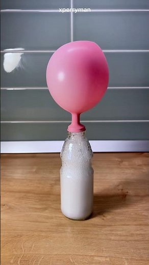 Self-inflating balloon using vinegar and baking soda