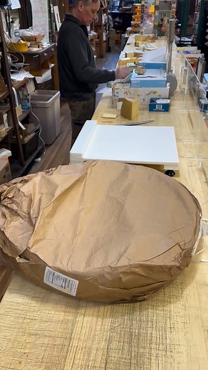 Busy day on the cheese counter unwrapping all our new holiday cheeses!! Stop in this weekend and check out the holiday list! | DeVries & Company 1887