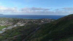 clip-1022613619-flying-over-honolulu-hawaii