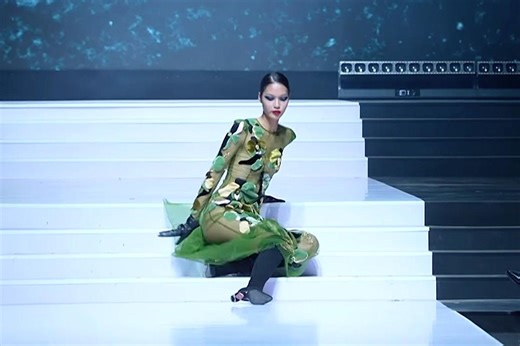 “Next Top Model” Winner Takes Shocking Fall Down Runway Steps at Vietnam International Fashion Week