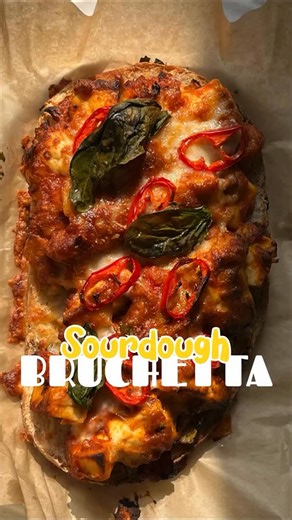 Prateek Goyal on Instagram: "Cheese Bruschetta Sourdough 🧀🔥 Crispy bread. Creamy filling. Melty cheese. I made this, I ate this, and trust me — IT SLAPS. Solid 10/10 banger. How to make? The Creamy Filling: Heat a pan and add 2 teaspoons butter. Throw in ½ cup finely chopped onions and 3–4 garlic cloves, sauté till soft and fragrant. Add 1 tomato puree, mix gently and season with salt, black pepper and red chilli flakes. Finish it off with 2 teaspoons thick cream and mix till rich and glossy. 