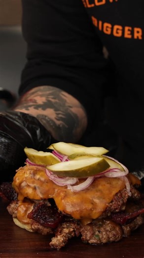 Be the master of your cookout with this Ranch Hand Leftover Brisket Smash Burger 🍔🔥 Ingredients ⬇️ 5 lbs brisket scraps 10 oz whole jalapeños 2 tsp red pepper flakes 1 cup mayonnaise 1/4 cup bbq sauce 2 tbsp brown mustard 1/2 tsp garlic powder 1/2 tsp smoked paprika 1 tsp black pepper 1/2 tsp salt Pit Boss Lone Star Brisket Rub Candied bacon 1 red onion, thinly sliced Pickle slices 16 slices of cheddar cheese 8 potato buns Instructions ⬇️ 1. Start by taking your leftover raw brisket and trimmi