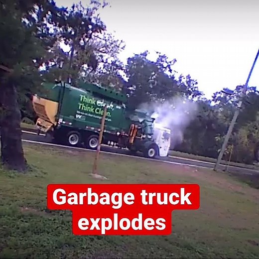 A waste management garbage truck explodes