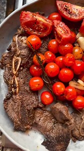 Let’s make this delicious Pan seared T-Bone steak smothered in seared tomatoes, so delicious and rich in protein. What you will need:- 1kg T-bone steak cut into thin slices 1 teaspoon garlic mince 1 teaspoon ginger mince Salt to taste 1 teaspoon black pepper corns crushed 1/4 cup white vinegar 200g cherry tomatoes 5 Tomatoes cut into 1/4s 50g butter for pan searing 5-6 garlic cloves 2 sticks rosemary What to do:- In a bowl add in the T-bone steak marinate with garlic, ginger, salt, black pepper,