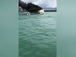 Fisherman rescues men from waters after their boat caught fire