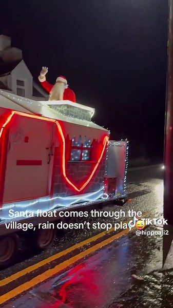 Santa Float Delights Village Despite Rainy Weather