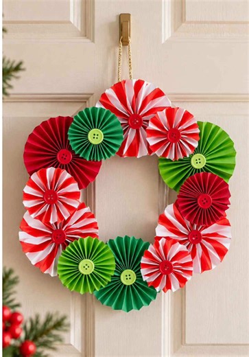 It’s amazing what you can make with just a few sheets of colored paper! ✨ These folded paper rosettes come together to make a beautiful DIY Christmas wreath that’s perfect for holiday decorating. Customize this easy paper Christmas craft with your favorite festive colors, patterns, and paper to match your Christmas decor. It’s a simple handmade holiday decoration that looks so pretty on a door, wall, or mantel. 🎄 Save this DIY Christmas wreath idea for later! #christmascrafts #diychristmas #chr