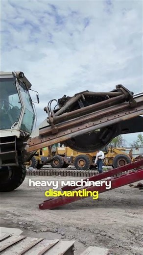 You Don't See This Every Day – Rare White CAT Grader Arrives for Renewal