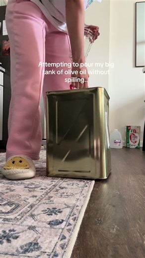 Pouring Large Olive Oil Tank Without Spilling