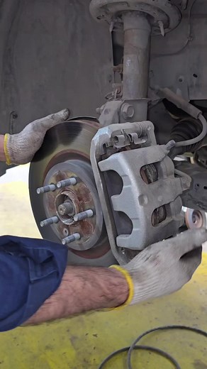 Ford Taurus front brake service install new brake pads #automotive #tips #garage #mechanic
