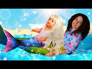 Magic bubbles for the baby doll! Princess turns into a mermaid with a mermaid tail.