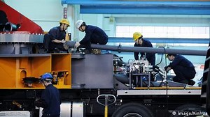 China slows spending abroad