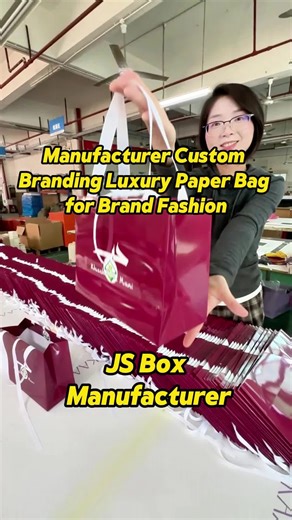 Customized shopping bag for clothing brand , red color and white logo , simple but modern, glossy lamination make the bag more attractive. #giftbag#shoppingbag #clothingbrand #packagingdesign #packagingsolutions #custompackaging #packagingsupplies #fashionbrand #usa #france #jsbox